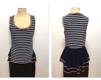 Sleeveless Navy and white striped tank top with navy chiffon cascading peplum , floral piping