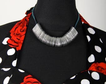 Necklace with a silver caps