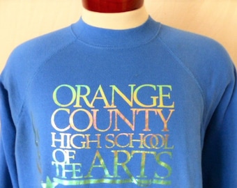 vintage 80's OCSA Orange County High School of the Arts blue fleece graphic sweatshirt crew neck iridescent logo print raglan pullover