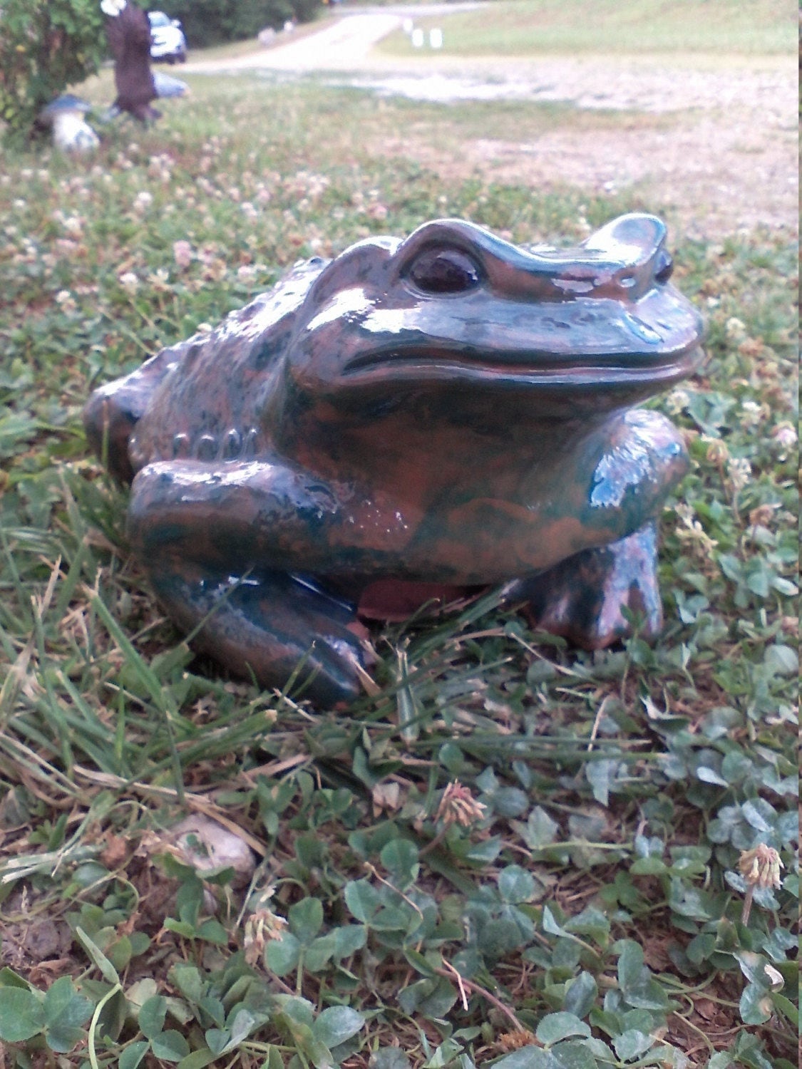 outdoor frog statue