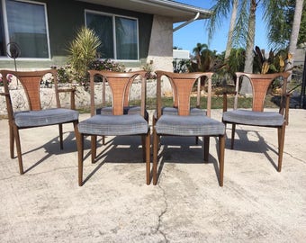 Mid Century Modern walnut dining chairs by United Furniture Corp.