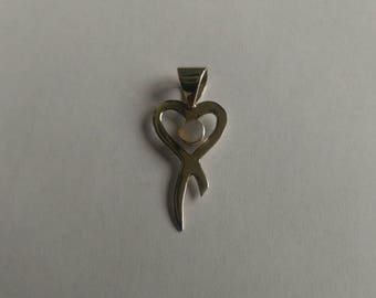 Handmade Sterling 925 silver and moonstone pendant.