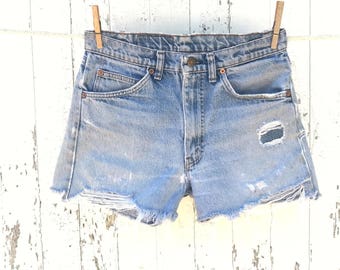 Items similar to INDIO High waisted denim shorts super frayed with ...