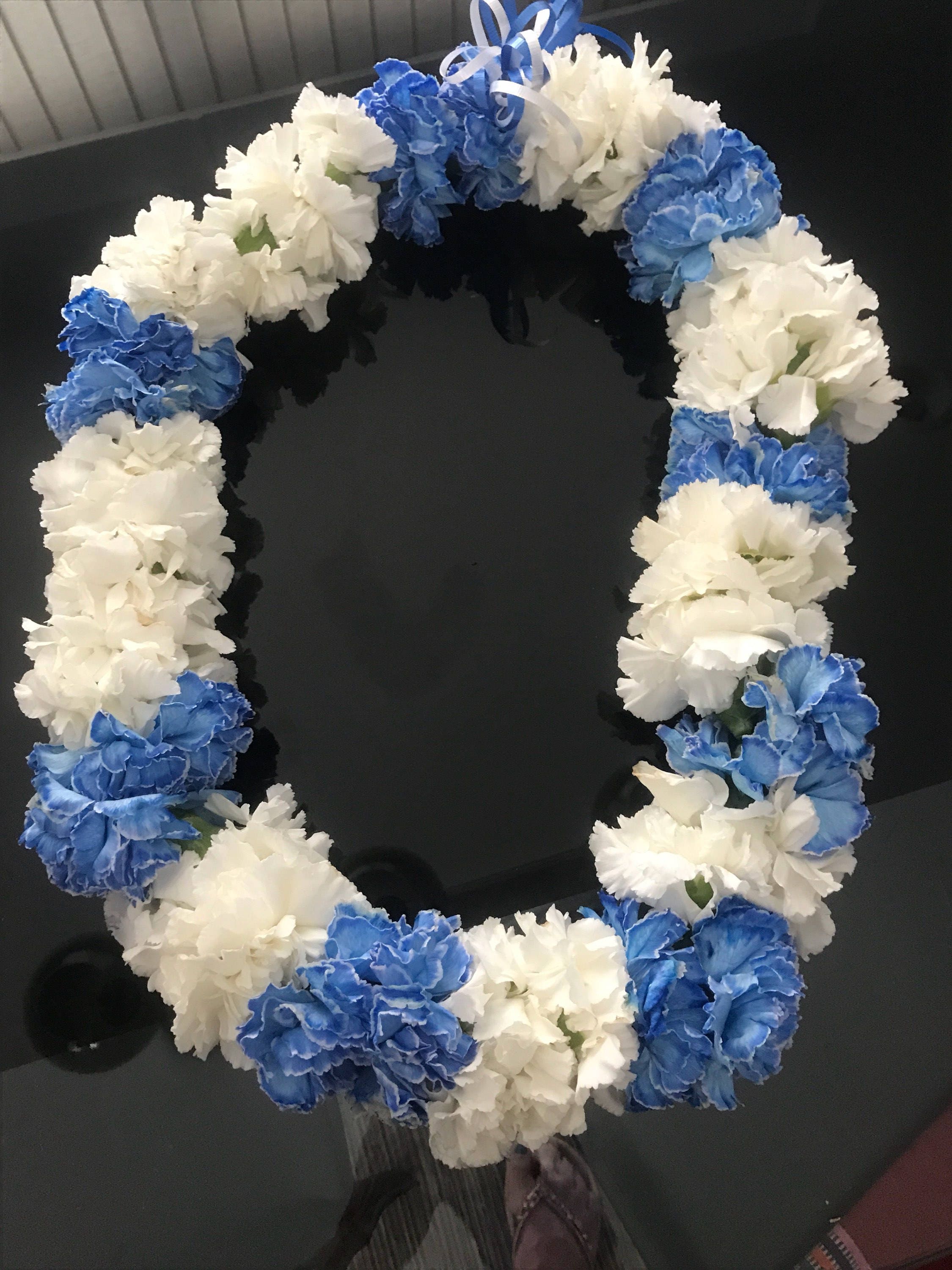 Carnation double single carnation candy Lei. Orchid lei will