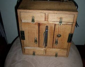 clear wood 2 drawer box with 2 doors and 2 hidden compartments