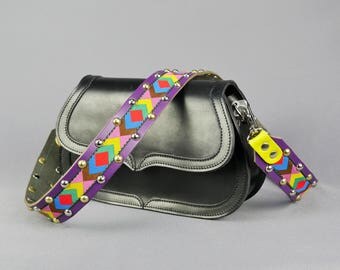 leather purse with guitar strap