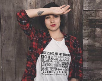Human Rights shirt black lives matter pro choice feminist shirt science is real build bridges not walls love is love no ban no wall feminism