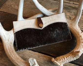 Hair on hide leather clutch