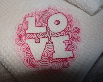 Large tea towel embroidered "love"