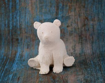 little bear statue or panda painting