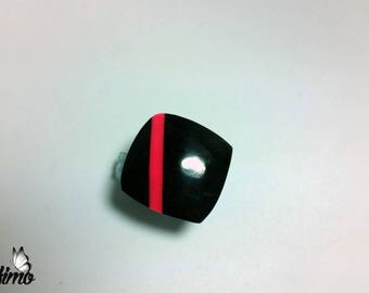 Square, black and neon pink ring