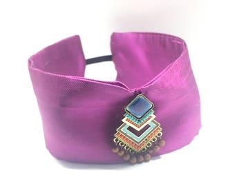 With ethnic beading vintage turban