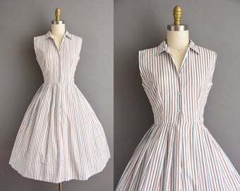 vintage 1950s dress. 50s burnt orange and blue cotton stripe vintage dress