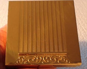 Vintage Avon compact. Gold tone square. Heavy brass metal. For pressed powder.