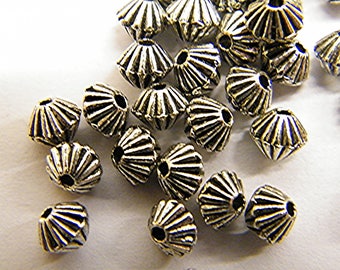 Beads and Tibetan silver, by 50 pieces