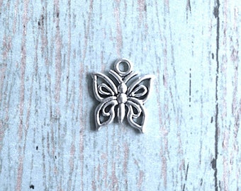 10 Small butterfly charms (1 sided) silver tone - silver butterfly pendants, insect charms, nature charms, papillon charm, spring charm, N11