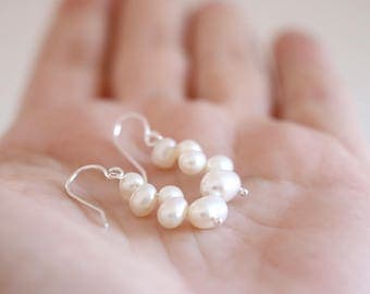 White Pearl earrings. Sterling silver earrings with sweet water cultivated white Pearls. White pearl dangles, pearl dangles, silver dangles.