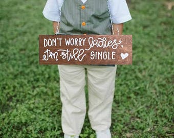 i'm still single sign / don't worry ladies / daddy here comes mommy sign / wedding sign / ring bearer sign / aisle sign.