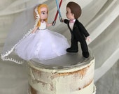 Cute Couple Dueling with Lightsabers