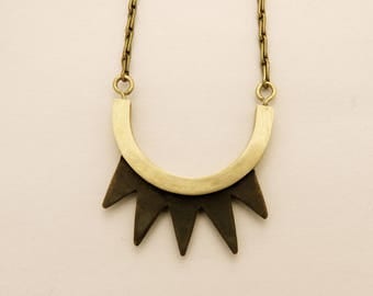 Long blackened brass spikes
