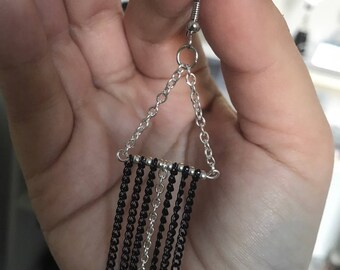 Black and silver dangling earrings