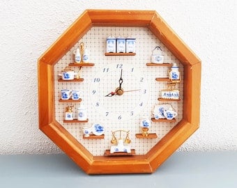 Rare clock from the seventies , hand made with china doll house items