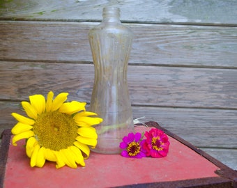 Vintage clear glass bottle