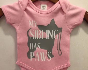 My Sibling Has Paws baby onesie