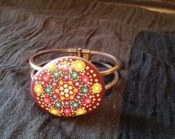 Bracelet stone painted bubbles mandala on Burgundy background