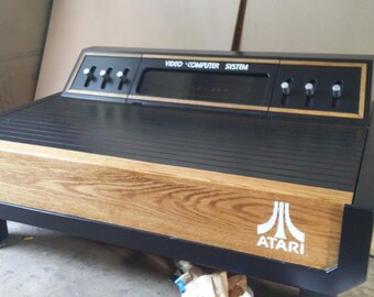 Atari 2600 5 piece furniture set with 100 games..limited availability
