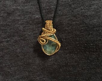 Polished Cut Kyanite Wire Wrapped Pendant