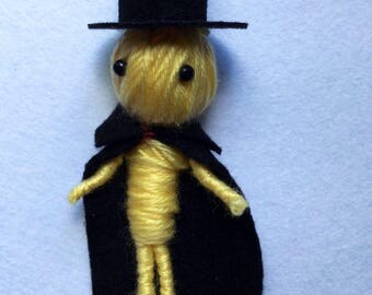 yellow voodoo doll