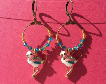 Bronze dream hoop earrings with charms.