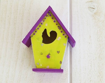 Decorative standing or wall mounted birdhouse