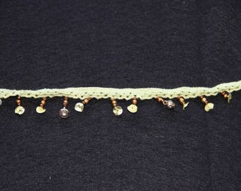 Green stripe beads and bells