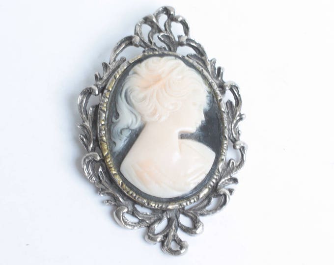 Molded Resin Cameo Brooch Off White and Black Fancy Silver Tone Frame Mid Century