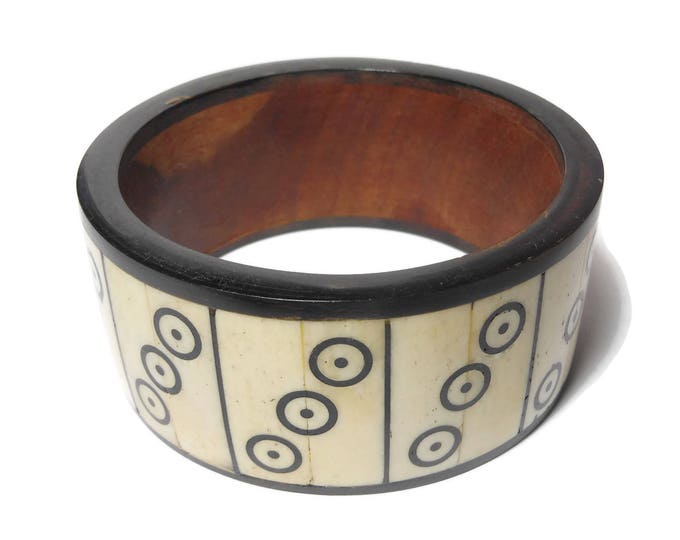 FREE SHIPPING Bone and wood bangle bracelet, Tribal, bone sections form dots and circles, dark wood frames, hand crafted, chunky cuff boho