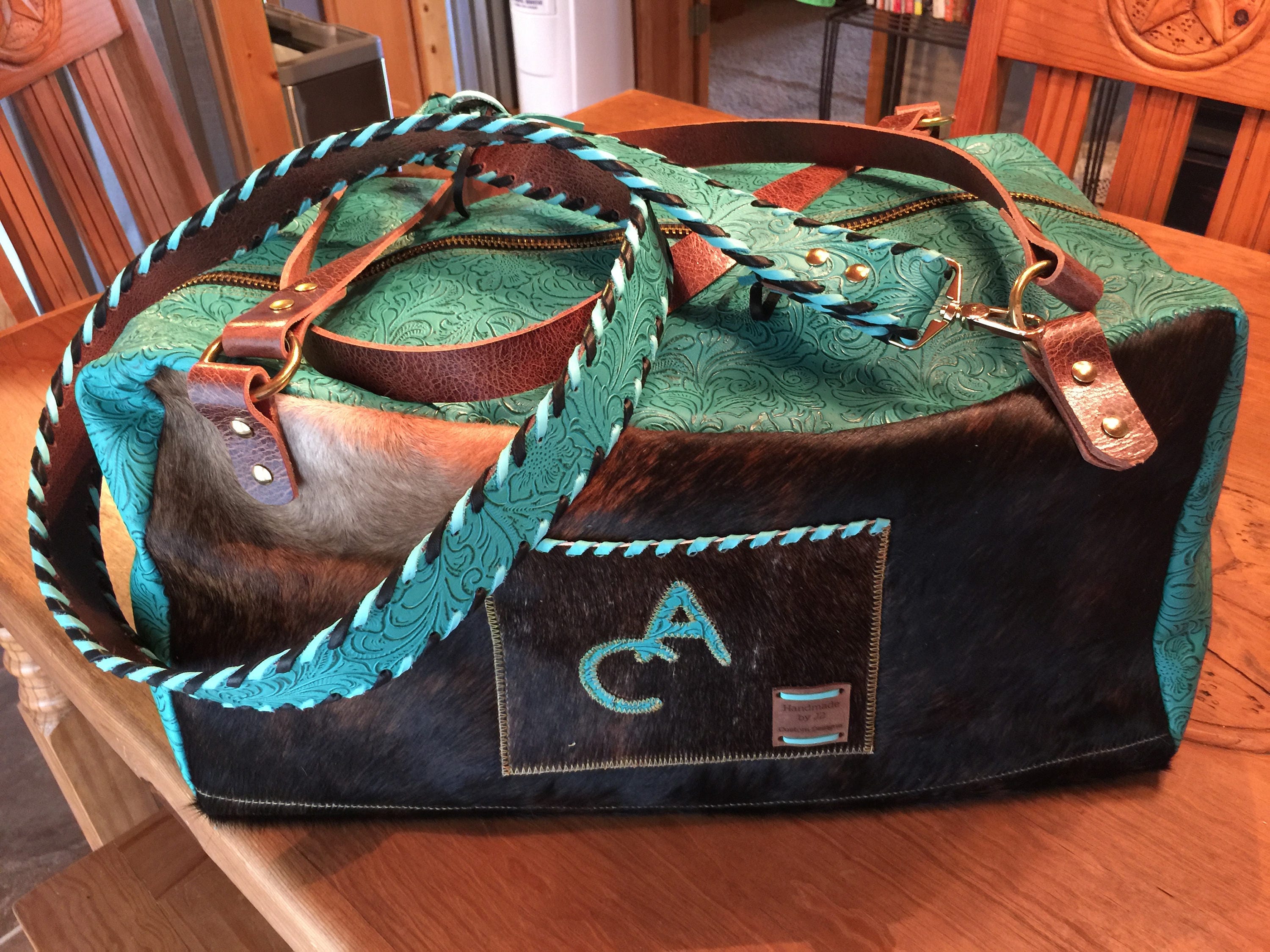 Custom made to order Cowhide and Leather Duffel Bag with extra Strap