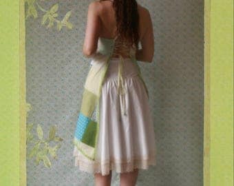 apron patchwork in shades of green, blue and white patterns