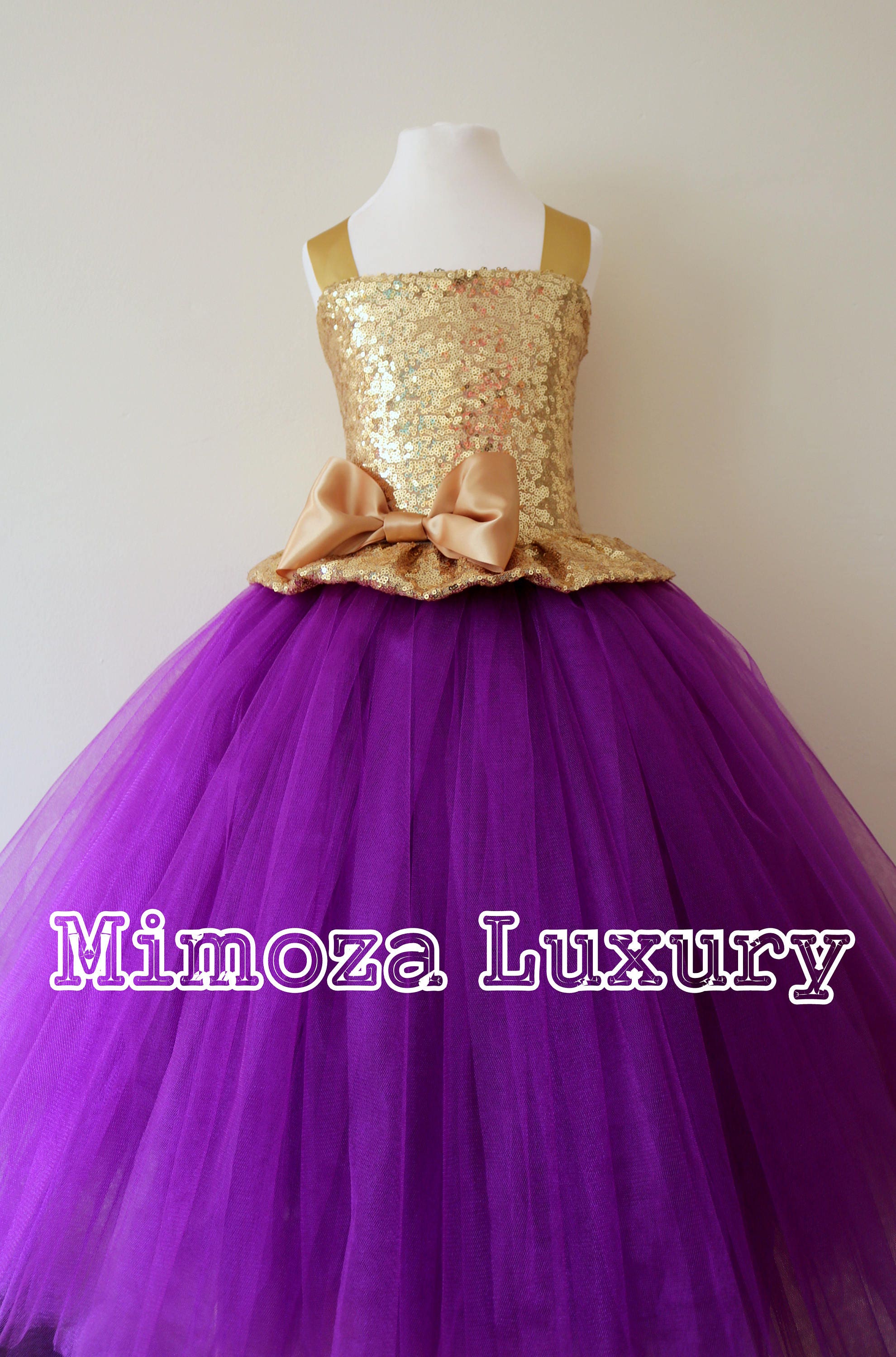 gold and purple outfits