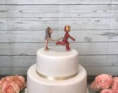 Wonder Woman Lassoing Running Iron Man