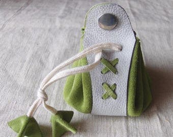 Coin purse is grey-green leather