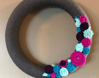 Gray teal and fuscia yarn and felt wreath