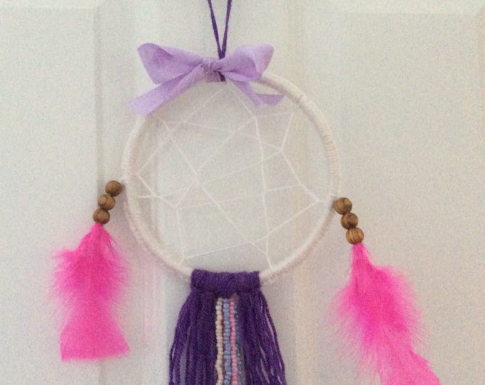 Beautiful dream catcher in purple and pink