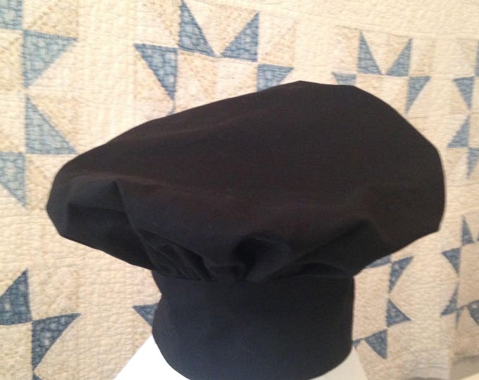 Black Child's Chef Hat. Adjustable with Hook and Loop tape. Fits ages 2 to 6.