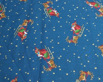 Santa's Sleigh on Blue Cotton Fabric