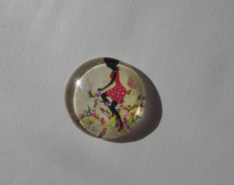 Beautiful cabochon 25 mm round domed with his wife on her bike face image