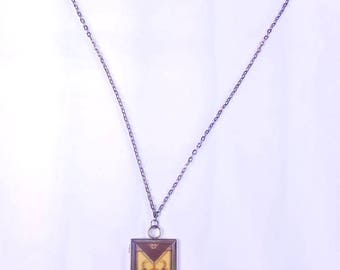 Double-Sided, Arabesque and Japonaise Clippings Under Glass, on Silver-tone Chain