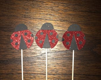 12 ladybug cupcake toppers.