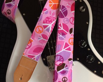 Groovy 60s-inspired peace signs guitar strap -- peace signs rock out -- shades of pink, orange, lilac and white